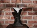 Volcanic cast aluminium table lamp. POA.
